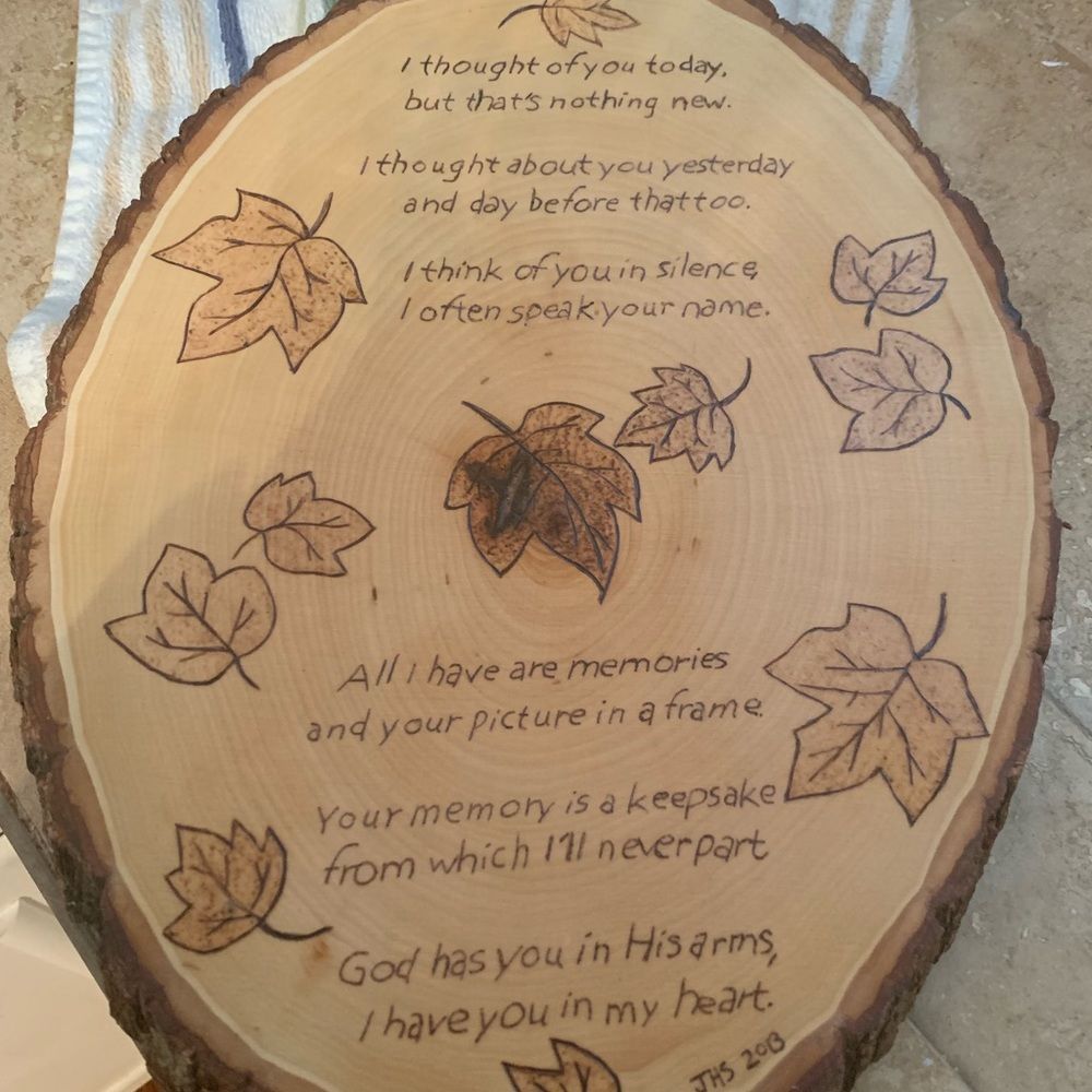 Wood-burned in memory sign
